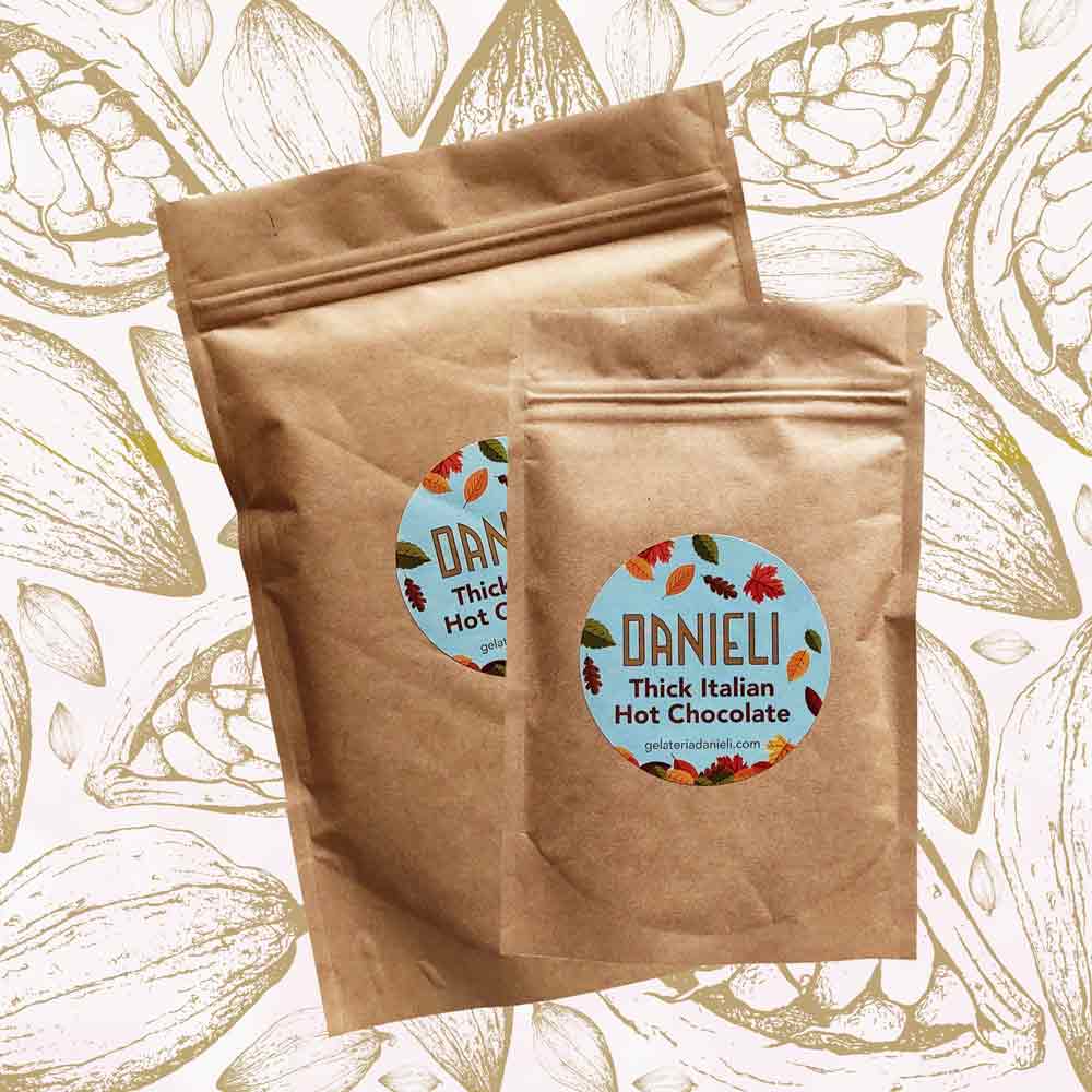 Danieli luxury hot chocolate collection against a cacao background