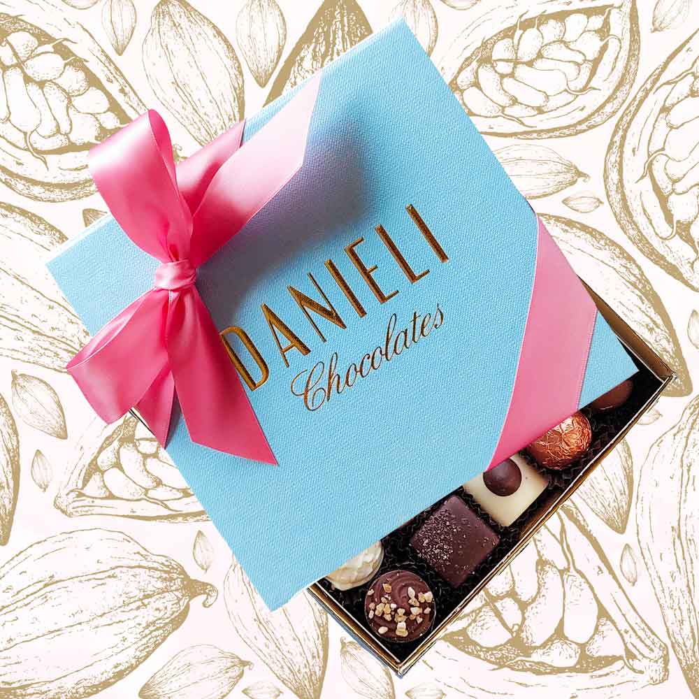 Chocolates for Mother's Day with 20-22 chocolates with a pink ribbon