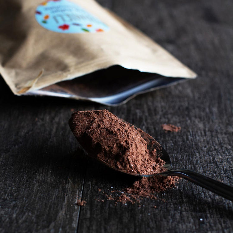 Danieli luxury hot chocolate collection against a cacao background