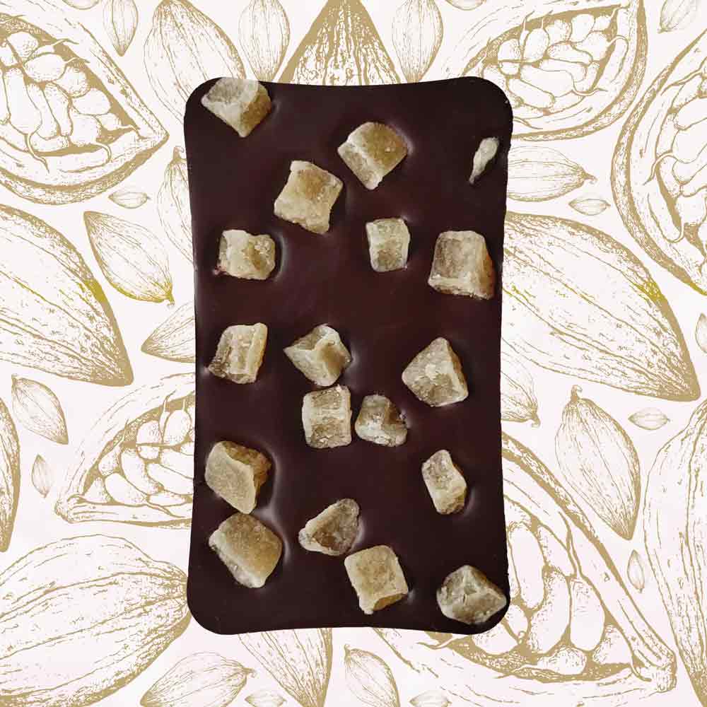 whole bar of Danieli dark chocolate ginger bar on a cacao background