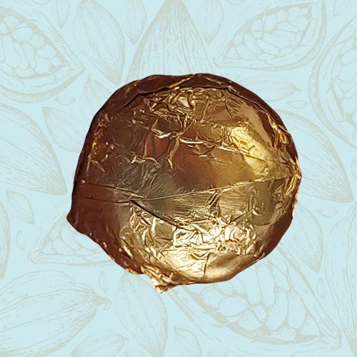 Danieli individual chocolates dark chocolate passion fruit truffle on a blue and brown cacao pod background