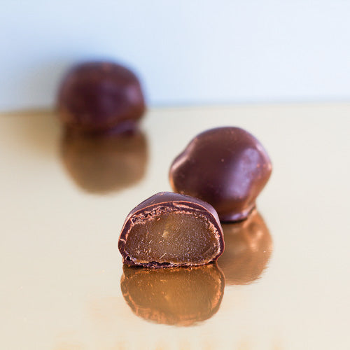 Dark chocolate ginger on a gold background