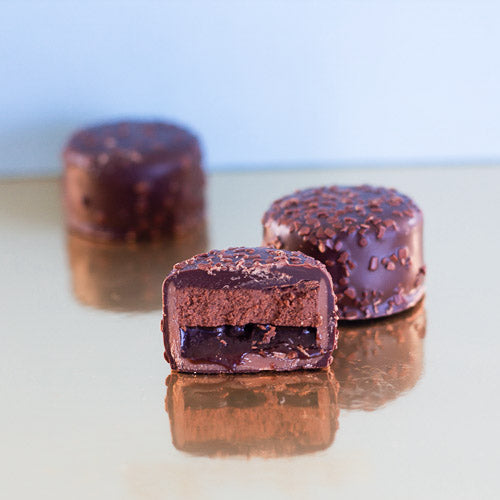 Dark chocolate mousse on a gold background 