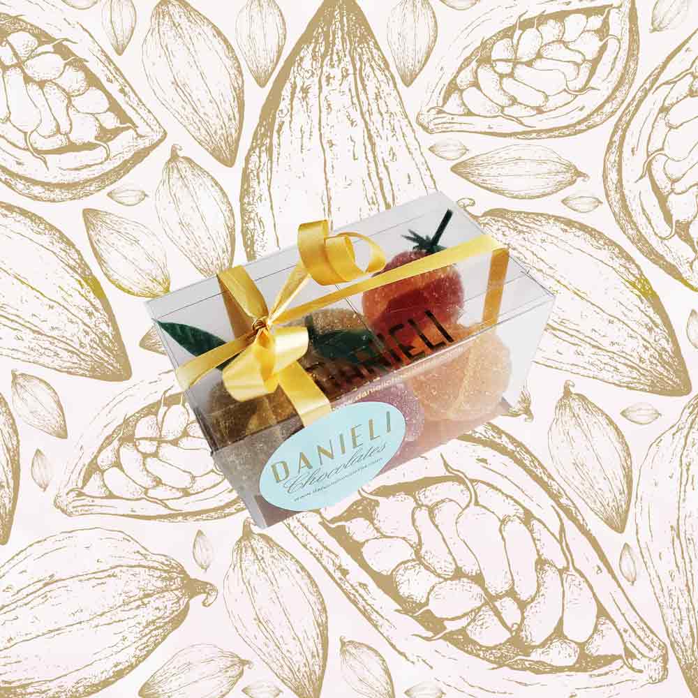side view of a presentation box of Danieli fruit jellies on a cacao background