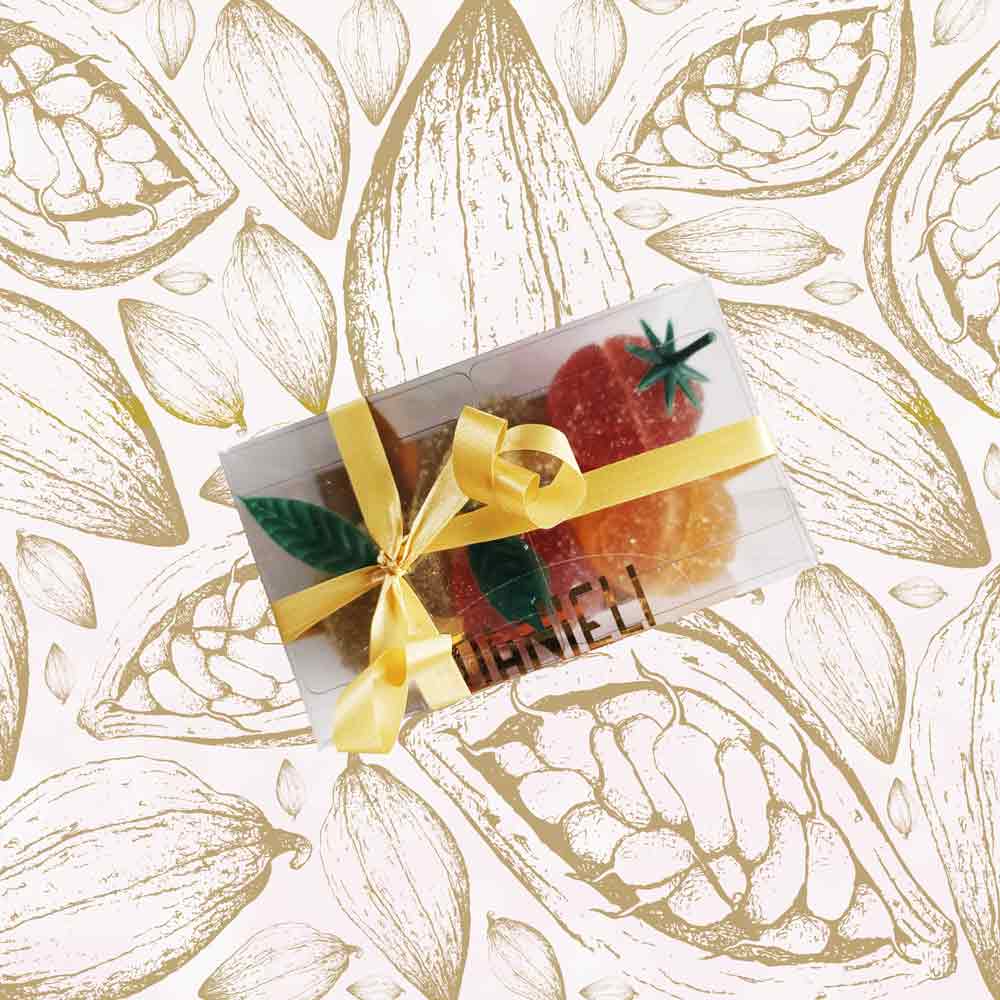 top view of a presentation box of Danieli fruit jellies on a cacao background