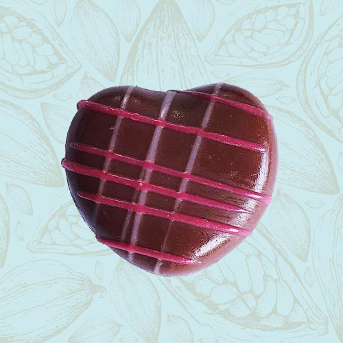 Danieli individual chocolates milk chocolate strawberry cream heart on a blue and brown cacao pod background
