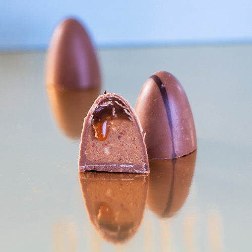 Milk chocolate salted peanut on a gold background